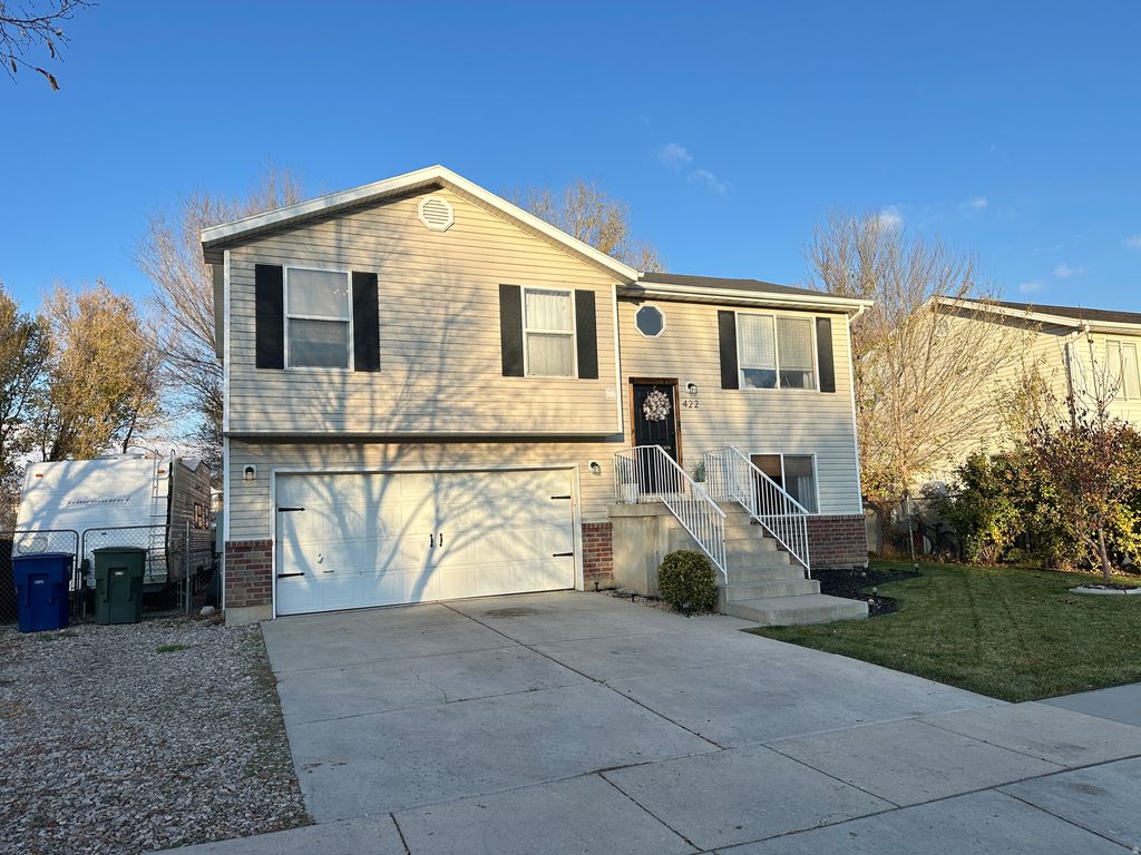 Photo of 422 W MEADOWBROOK DR, Ogden, UT 84404 (MLS # 2124302)