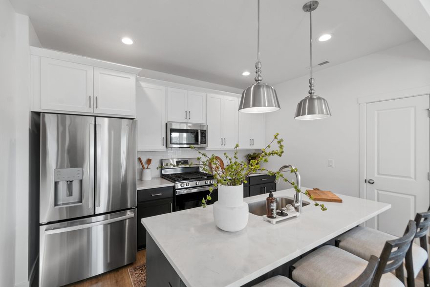 Elevate your homeownership journey with a 3.99% first-year rate and 4.99% long-term 30-year fixed on this beautifully designed Oxley townhome at Beacon Pointe! With 2,364 sq. ft., this home offers 3 bedrooms, 2 baths, a 2-car garage, and a full unfinished basement with room for two more bedrooms and a third bath. Enjoy low-maintenance living-HOA dues include high-speed fiber internet and full exterior landscaping. The open-concept main floor features a modern kitchen with quartz countertops, stainless steel appliances, and stylish finishes throughout. Upstairs, the vaulted primary suite provides a relaxing retreat with a spa-inspired bath and walk-in closet. Beacon Pointe adds resort-style amenities such as a pool, pickleball courts, playgrounds, and scenic open spaces.mJust steps from the Saratoga Springs Temple and boasting incredible Mount Timpanogos views, the Oxley delivers unbeatable comfort, location, and value. *Lender Incentive: Must use Destination Homes' preferred lender, First Colony Mortgage. Terms, rates, and eligibility vary; not all buyers will qualify. Offer subject to change. See Sales Agent for details.  Some interior photos may be from a similar or staged unit.