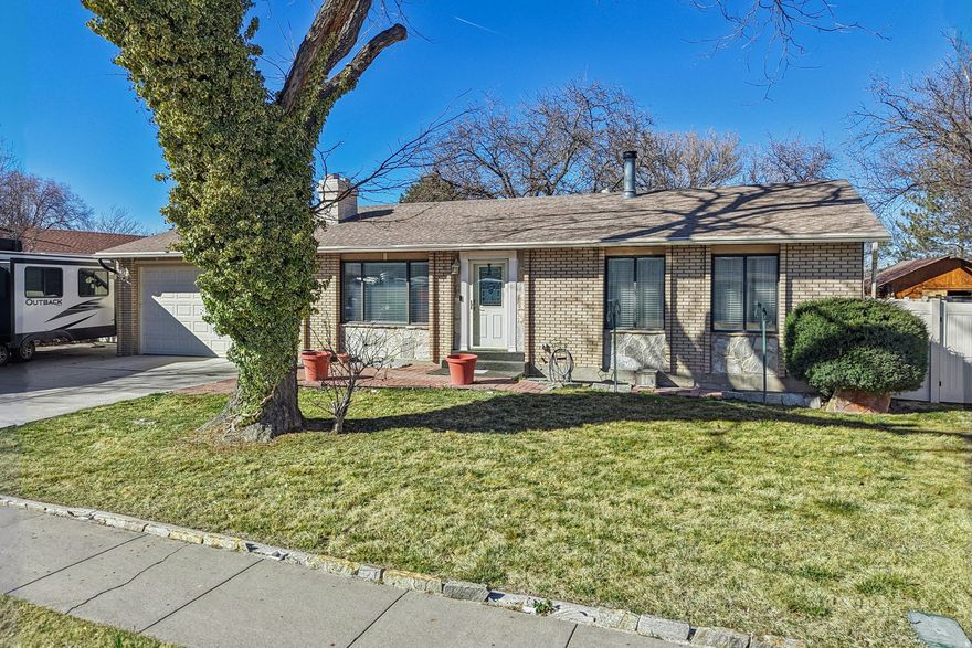 Beautifully updated 3-bedroom, 2-bath home plus a large office in a well-established Riverton neighborhood! This move-in ready gem sits on 0.23 acres and has been systematically upgraded, featuring a brand new AC, furnace, tankless water heater, and water softener (all 2023), a completely rebuilt main bathroom with a stunning walk-in shower, barn door glass entry, and farmhouse vanity, plus a new fence and custom outdoor lighting. The main floor impresses with natural light, wood flooring, a functional kitchen with island outlets and pull-out shelves, and French doors with built-in blinds leading to a large partially covered back deck. The primary suite is spacious, with a walk-in closet, and deck access directly from the room. Downstairs offers a spacious family/game room with a tiled bar area, two additional bedrooms, an updated bath, and generous laundry/storage space. Outside you'll love the mature shade trees, oversized garage, shed, and rare extra-long RV parking. A great home in a great neighborhood, come check it out for yourself!    Square footage figures are provided as a courtesy estimate only and were obtained from appraisal.  Buyer is advised to obtain an independent measurement.