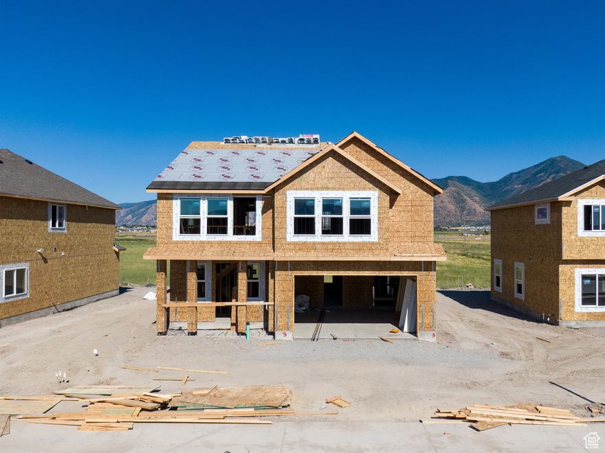 AMAZING $10,000 INCENTIVE TOWARDS CLOSING COSTS, RATE BUYDOWN, OR PRICE REDUCTION REGARDLESS OF LENDER! Must-See New Arrowhead Springs Community in Salem! This beautiful home is being built by Flagship Homes and features 3 bedrooms, 2.5 bathrooms, quartz slab countertops, painted cabinets, laminate flooring on the main level, landscaped front yard, 2 car garage, and backyard (can be landscaped for an additional charge). The primary bedroom has a vaulted ceiling, large walk-in closet, and dual sinks with a separate tub/shower. Home will be completed and ready to move into in October 2025. Call for more information or stop by our model home at 1074 N 1020 W Salem, Utah 84653 for a tour. Model home hours: Monday-Saturday 11 AM - 6 PM. Buyers to verify all information. Square footage is from house plans.