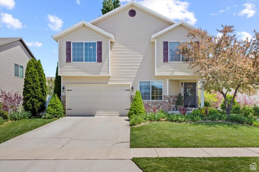 Paid-off solar, brand new carpet, and extensive upgrades make this home shine. Inside you'll find custom built-ins, crown molding, wainscoting, designer accent walls, and a premium water filtration system. A new HVAC system with dual furnaces and A/C units ensures efficient comfort year-round. Outside, the cottage-style landscaping provides color year-round in every season. Located steps from walking trails, pickleball courts, baseball fields, disc golf, a large city park, and the new city recreation center opening Fall 2025.