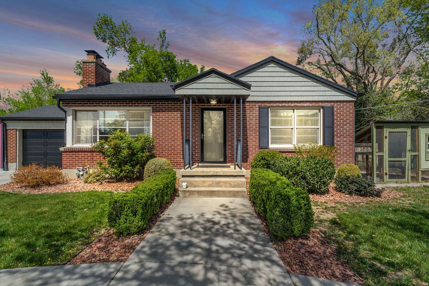 Beautifully updated residence in one of Holladay's most desirable locations, just minutes from premier shopping, dining, parks, and everyday conveniences. Ideal as a full-time residence, second home, or investment opportunity, this 3-bedroom, 2-bath home also offers a versatile fourth room perfect for a home office, TV room, or exercise space.  The main living area offers a spacious and inviting feel, highlighted by a beautifully tiled gas fireplace. The kitchen is designed for those who love to cook, featuring a gas range, stainless steel appliances, granite countertops, and a new kitchen floor that adds a fresh, modern touch.  The home showcases modern bathroom finishes, custom cabinetry, and updated tile throughout. The primary bedroom is generously sized with a walk-in closet, while additional storage downstairs provides plenty of space for organization.  The outdoor space is a true highlight, offering a private and well-appointed backyard perfect for entertaining or relaxing. Enjoy mature landscaping, garden beds, a chicken coop, and a storage shed for added convenience. The backyard offers both functionality and charm, making it easy to enjoy year-round.  A rare opportunity to own a well-located, move-in-ready home with great indoor-outdoor living