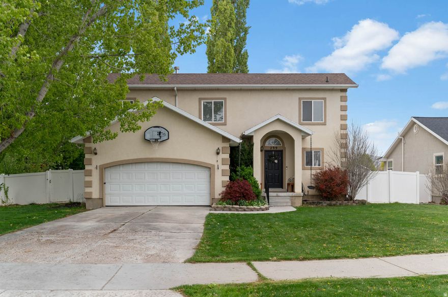 Welcome to your new home with a remodeled vibey kitchen, main level living, and a fully finished basement. Set on a generous quarter-acre lot in the Dry Creek neighborhood, this 5-bedroom, 3-bath home gives you room to spread out, settle in, and finally have a place for everything (and everyone... and all their stuff). Main Levels, vaulted ceilings and a bright, open great room create an easy, welcoming flow without sacrificing bedrooms, while the updated kitchen keeps everything functional and connected. Downstairs? Fully finished and ready to flex with movie nights, game days, hobby zone, or that second living space you'll wonder how you ever lived without. >>> Step outside and this is where it really shines - a flat, fully fenced yard with mature trees gives you privacy and room to move, while raised garden beds are ready for your next attempt at becoming a tomato person. And yes... it comes with a zip line. And no - you're not too old for it. >>> Oh - and Paid Off/Owned solar panels help keep utility costs in check just as an extra bonus. >>> Close to everything but quiet enough to forget you're close to everything. Enjoy the value add that comes with a community that is still building and growing! #PaysonLife