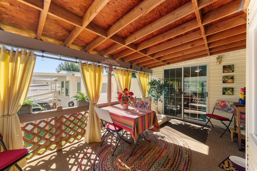 Embrace the vibrant lifestyle you deserve in your dream retirement home located in the 55+ community of Kings Row. Truly feel the comfort and calming feeling when you approach this one of a kind covered cozy beamed deck which reminds you of a separate living space to relax and take in the surroundings. But wait! Now enter this charming great room with a bay window, custom blinds, draperies, new carpet, fresh paint and new microwave. Features include well-maintained and extra clean 2 bedrooms & 1 bath which offers space and comfort including the washer/dryer, loads of storage, private backyard and more. Furnishings are available for sale for a reasonable price.  List to be provided. Discover a world of active living with great amenities and a friendly environment. Low HOA dues.