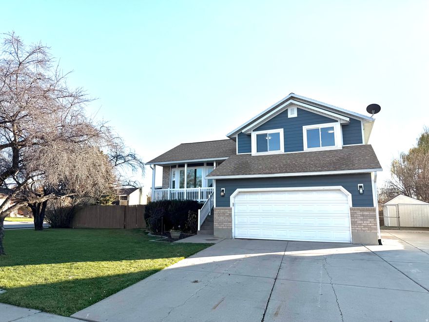 Beautifully refreshed inside and out! This stunning home has been updated from top to bottom, featuring all-new flooring, fresh carpet, modern waterproof laminate, and professional interior paint throughout, giving every room a clean, bright, and inviting feel. Enjoy two fully remodeled bathrooms, each designed with stylish tile showers and contemporary finishes. The luxurious master bathroom offers an oversized tile shower and a double-sink vanity, creating a spa-like retreat right at home. The updated kitchen is ideal for cooking and entertaining, complete with double ovens, an electric cooktop, granite countertops, and refreshed finishes that blend function and modern style. The home also includes updated electrical throughout, with new LED can and LED lighting, upgraded outlets, and new switches, adding both efficiency and modern convenience. Outside, the home shines with a beautifully updated exterior featuring new Hardie board siding, updated windows, and solar panels to help with energy efficiency. The yard has also been fully refreshed with new sprinkler lines, a new timer box, garden boxes, and brand-new sod in the backyard. Additional outdoor features include a storage shed, a fully fenced yard offering extra privacy and room to enjoy, and the benefits of a spacious corner lot. Located in a quiet, low-traffic neighborhood, the home offers a peaceful setting while remaining just minutes from great dining, shopping, and local conveniences. Move-in ready and thoughtfully updated, this home offers the perfect blend of comfort, style, and modern convenience.