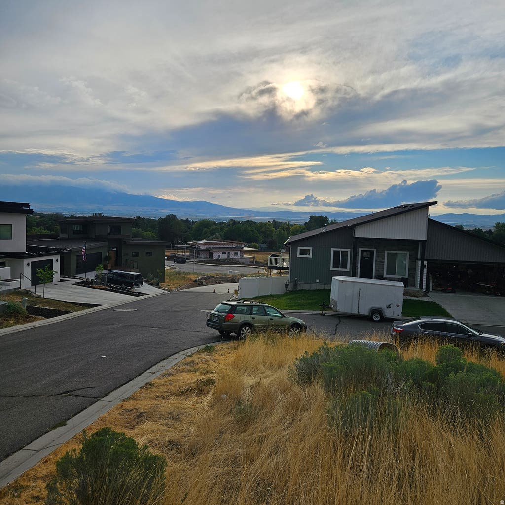 Photo of 1941 PEBBLE CREEK CT #82, Logan, UT 84341 (MLS # 2178477)