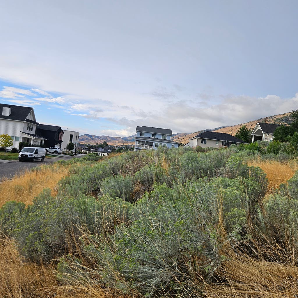 Photo of 1941 PEBBLE CREEK CT #82, Logan, UT 84341 (MLS # 2178477)