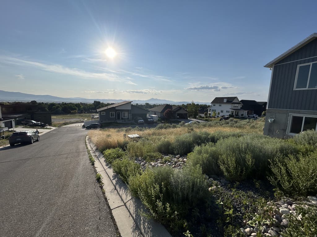 Photo of 1941 PEBBLE CREEK CT #82, Logan, UT 84341 (MLS # 2178477)