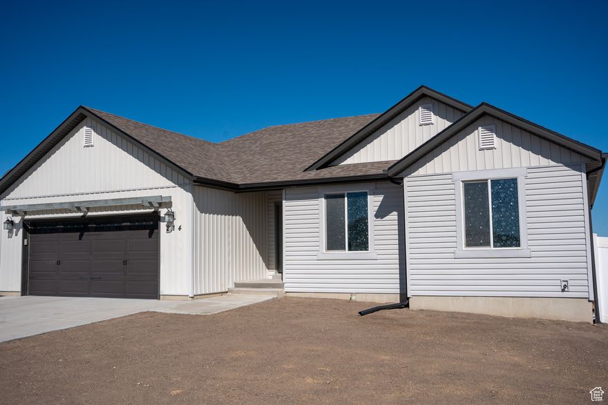 BEAUTIFUL HOME in new area of Grantsville! The home was hardly ever lived in as the owner spent all of this time in the shop! Updated tile and carpet looks like new! Tankless water heater so you never run out of hot water! New shop on the property that is fully insulated and heated. There is a car hoist installed and lots of room for parking. This home has endless possibilities for the do-it-yourself mechanic!