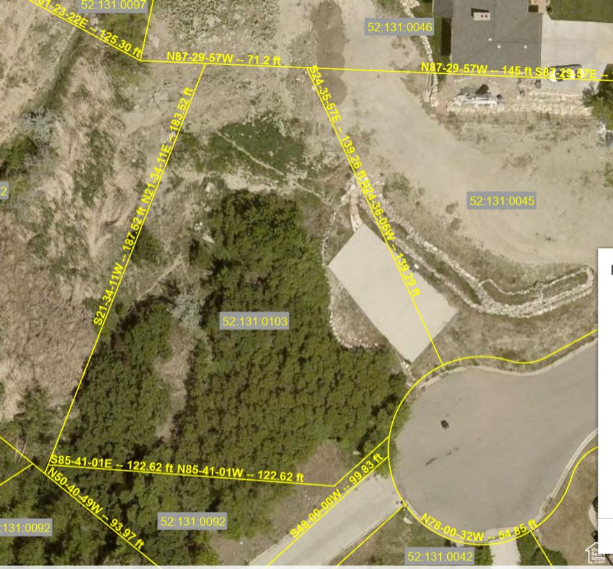 Mature trees with amazing views and plenty of space off the Norfolk Circle cul de sac. Buyer responsible for due diligence regarding substructures needed to support residential building structures in the area.  Property sold AS-IS.