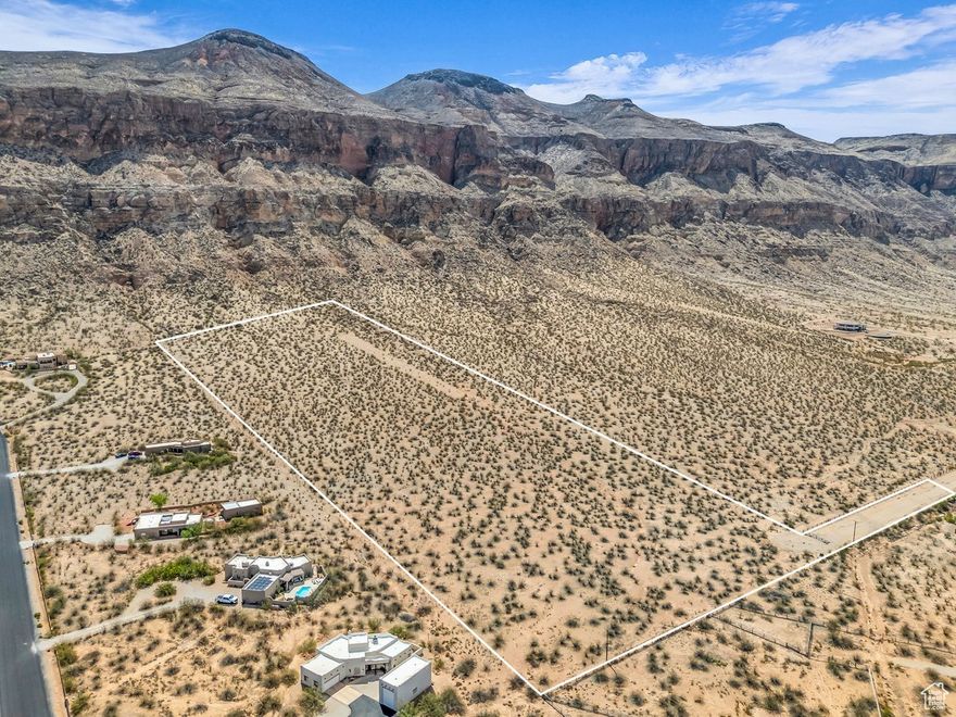 Exclusive 14.42-Acre Lot in Hurricane - Prime Location This is your chance to own one of the premier parcels in Hurricane-directly across from Copper Rock and just down the road from Sky Ranch Air Strip. This is one of the largest lots in the Moccasin Flats Development and the only one with private off-street access. Enjoy panoramic views of Pine Valley Mountain, Sand Hollow Reservoir, and Copper Rock Golf Course. Adventure and recreation are right nearby-Sand Hollow, Sand Mountain, and thousands of miles of UTV/ATV trails are just minutes away. Zoned for both residential and agricultural use, this property allows horses and livestock, offering the freedom to build a private estate, homestead, or even subdivide into 1-acre parcels.  This lot also qualifies for the Greenbelt Tax advantage, which can significantly reduce property taxes. City water and power are stubbed to the front of the lot, with a fire hydrant on site. Water right included. No HOA.