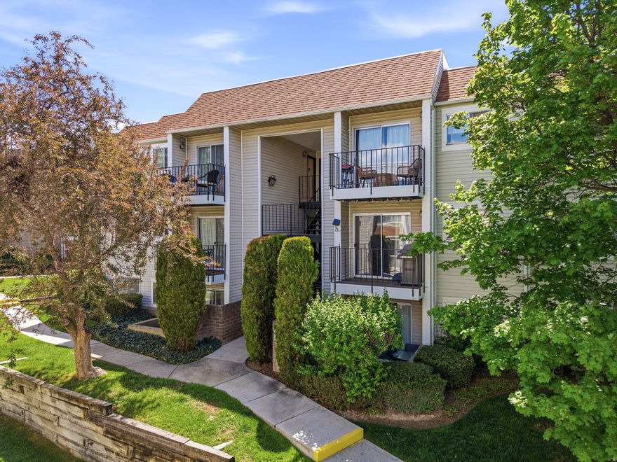 This secluded Quailbrook East condo features newer carpet and luxury vinyl plank flooring, all new stainless steel appliances, newer HVAC (furnace and AC), newer washer and dryer, two-tone paint, reverse osmosis water system, a private deck overlooking mature trees and walkways, and extra storage in the laundry room. Two conveniently located parking spaces are included (one covered and one uncovered), and all appliances are included. Located in the highly desirable Millcreek area, Quailbrook is a private community tucked behind 900 E along Little Cottonwood Creek, offering peaceful surroundings while still being close to everything. Enjoy beautifully maintained grounds and amenities including two clubhouses, two pools, tennis court, gym, sauna, gas grills, and picnic areas.