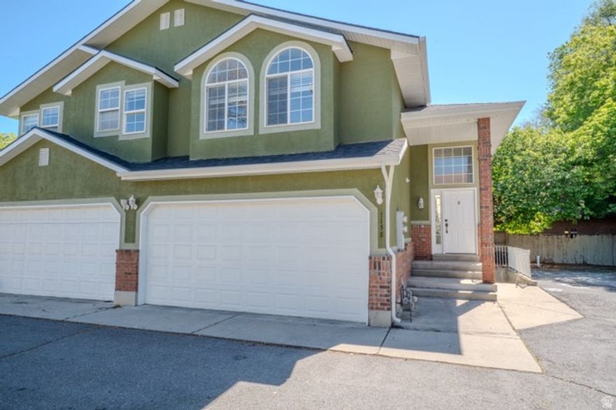 Fully Updated Townhouse in the Heart of Millcreek  Income Potential Included! This move-in-ready home has been beautifully updated with new flooring, fresh paint, a remodeled kitchen, new roof, and new gutters. The bright, open layout offers comfortable living in a prime central location close to shopping, dining, and freeway access. The basement features a separate mother-in-law apartment currently rented for $900/month, providing excellent income to help offset your mortgage and assist with qualifying. Tenants are on a month-to-month lease and can vacate at recording if desired. Turnkey condition with built-in income potential - don't miss this opportunity!