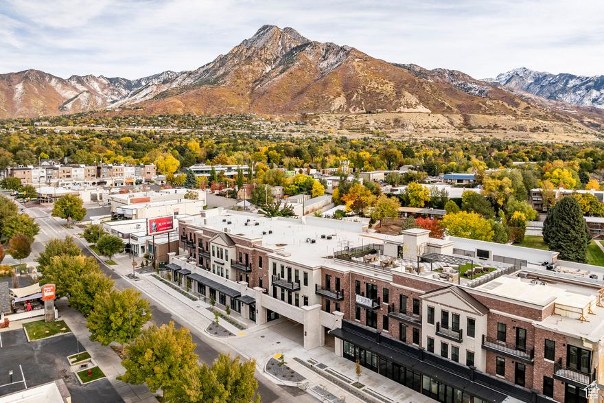 Discover effortless urban living at Apollo Square Condos in the heart of downtown Holladay. Now offering move-in ready, meticulously-designed luxury residences. These condos offer single-level living with 2-3 bedroom options, open floor plans, natural light, and amazing views of the surrounding mountains and valley. Each unit boasts designer finishes, private outdoor spaces, and sound-resistant rooms. The complex offers secure underground climate-controlled parking, elevators, and ample storage, ensuring your comfort and peace of mind. Enjoy living in the vibrant Holladay City Village, where everything is within walking distance, including dining, shopping, grocery stores, food trucks, coffee shops, bakeries, post office, and entertainment. When you're ready to relax or gather with friends, head up to the rooftop patio, complete with a fire pit, BBQ, TV, gazebo, and lounge area and soak in the 360 degree views of the mountains and Salt Lake Valley. Make Apollo Square your new home and enjoy the best of urban and mountain living with lock-and-leave convenience! Model unit is open 12:00 PM - 5:00 PM, Monday - Friday and Saturdays 11:00 AM - 4:00 PM