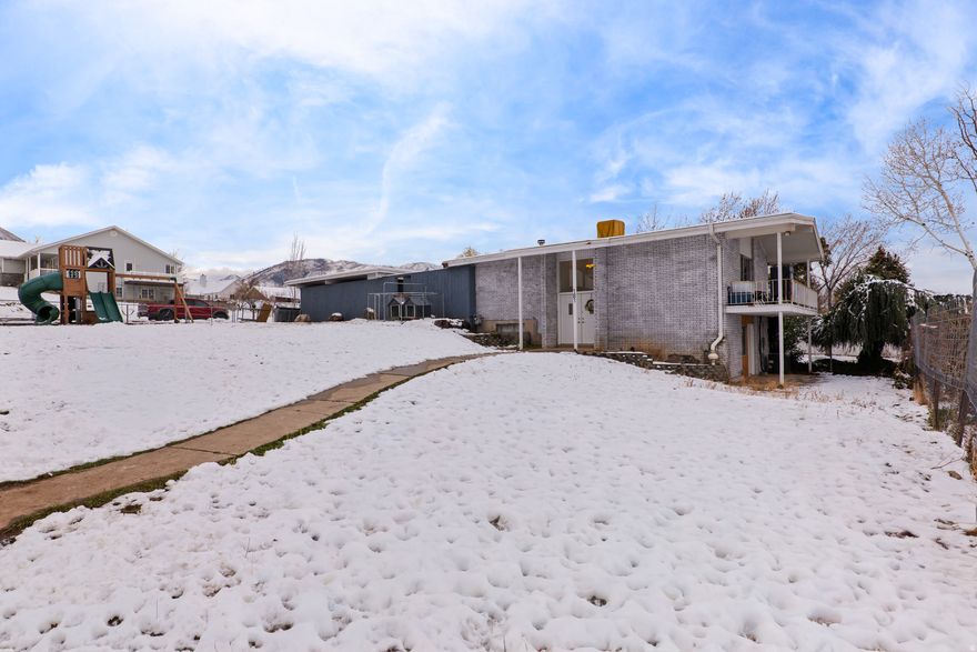 This rare Elk Ridge twin home offers exceptional value in south Utah County. Enjoy a spacious yard, private patio, and a well designed home featuring three bedrooms and three bathrooms, all at an affordable price. The surrounding views and mountain setting are truly remarkable. Please inquire about our preferred lender's 1-1 rate buy down option. Square footage figures are provided as a courtesy estimate only, and the buyer is advised to obtain an independent measurement.