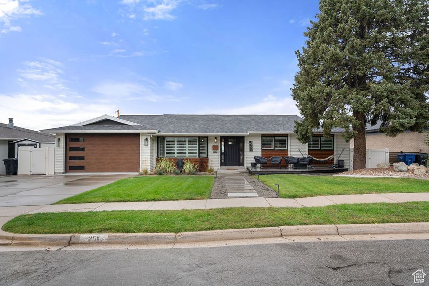 Enjoy breathtaking views of the mountains, valley, and city skyline from this Cottonwood Heights gem, featuring huge picture windows and two expansive decks perfect for relaxing or entertaining. The main level is filled with natural light and showcases a spacious floorplan. A kitchen remodel was started but not completed-giving the next owner a unique opportunity to finish it to their taste. The sale includes brand-new, high-quality appliances and fixtures already purchased and waiting in the garage: a ZLine 36" gas range, Kraus 50/50 stainless steel undermount sink (33"),  and Vigo faucet. The lower-level ADU offers incredible flexibility with its own entrance, large deck, kitchen with island, 3 bedrooms, full bath, and laundry-perfect for guests, rental income, or multi-generational living.  With unbeatable views, multiple decks, and plenty of potential, this home is ready to shine with your finishing touches! PLUS!! There is a unique full lower level beneath the basement with electricity-ideal for storage, workshop (not included in square footage).  Square footage figures are provided as a courtesy estimate only and were obtained from appraiser measurement.  Buyer is advised to obtain an independent measurement.