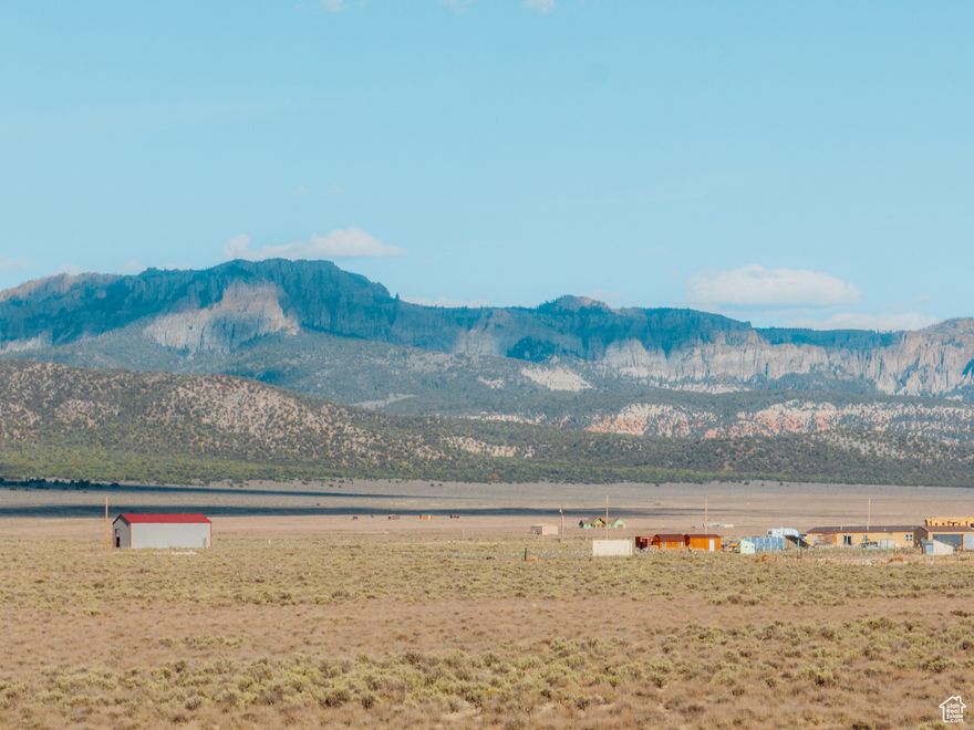 Make this beautiful 40 acres your private retreat, survey available! Whether you dream of a secluded escape or a serene local life, this property offers the best of both worlds. Imagine waking up to breathtaking sunrises and winding down with mesmerizing sunsets, all while being just minutes from town. With lots of space for horses and other large animals, this land is perfect for animal lovers. Nestled in the heart of the Panguitch Valley and a stone's throw from the Sevier River, these acres invite you to bring your vision to life. This property serves as an ideal base for endless outdoor adventures. Explore the wonders of Panguitch Lake and Bryce Canyon, both within a 45-minute drive, or venture to the east entrance of Zion National Park, just 1 hour and 45 minutes south, your gateway to nature's playground awaits.