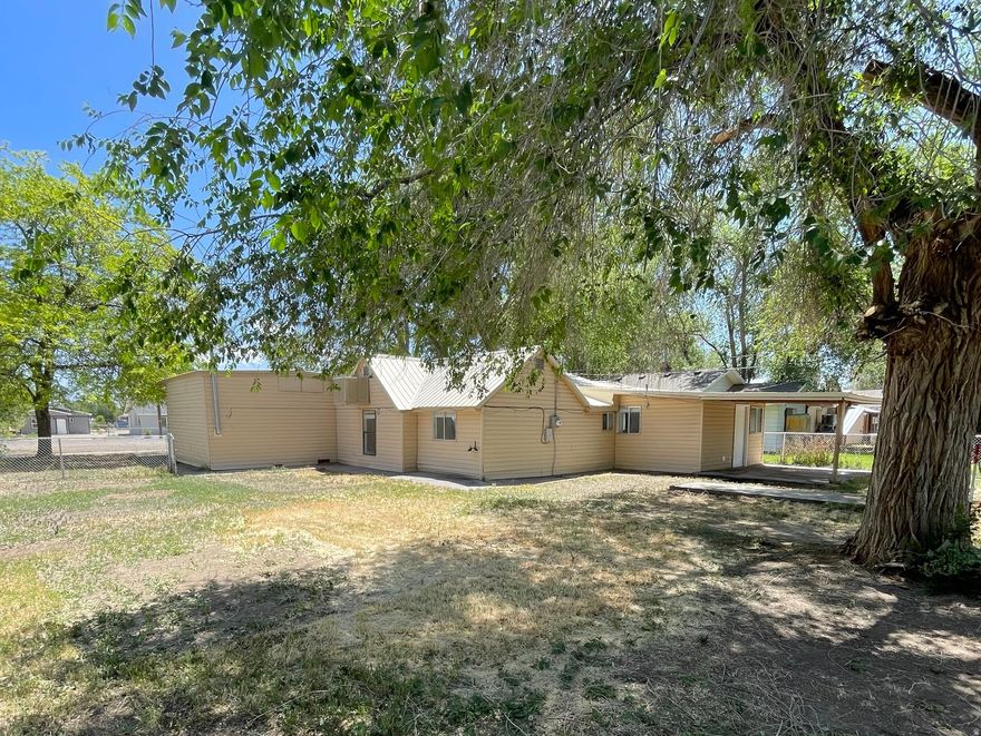 Beautifully remodeled home situated on nearly a half-acre lot! This move-in ready property features a fully updated kitchen, remodeled bathrooms, fresh interior paint, new flooring, updated hardware, and modern lighting throughout. The refrigerator, appliances, and window coverings are included, making this an exceptional value. Enjoy the spacious lot with plenty of room for outdoor living, gardening, parking, or future improvements. Priced to sell and ready for its new owner.