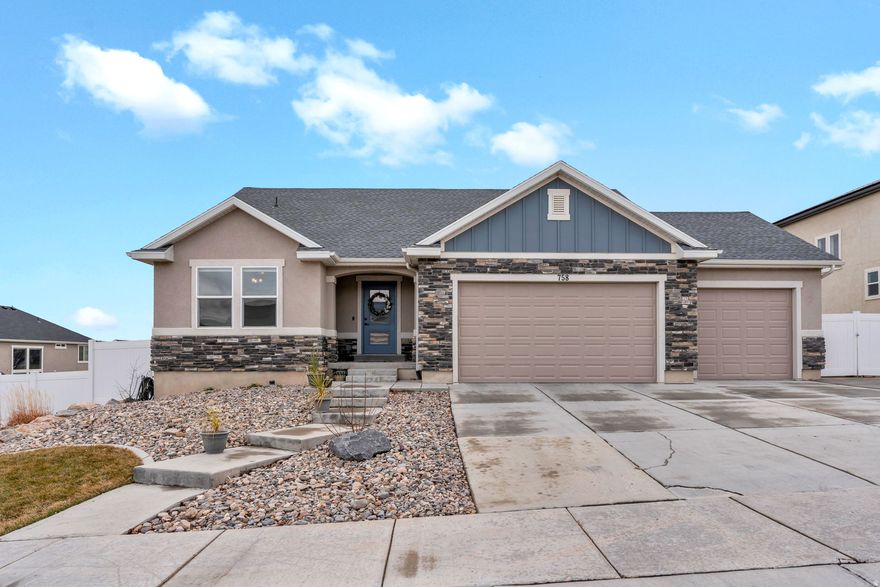 Experience incredible views and modern upgrades in this stunning Talus Ridge home backing directly onto Pinnacle Park with unobstructed views of the Wasatch Front and valley. Vaulted ceilings and an open layout highlight the main living space, featuring an entertainer's kitchen with a massive island seating 10+. A flexible front sitting room works perfectly as an office or additional living space, while the 9' daylight basement includes a spacious game room with pool table that can be included. Recent updates include a beautifully remodeled bathroom (2024) with a premium Kohler shower and a brand-new 30-year roof (2025). The fully insulated and heated 3-car garage offers an extra-deep third bay, workbench, and extensive overhead storage, plus dedicated RV parking alongside the home. Multiple storage areas, including large cold storage, provide exceptional functionality. Enjoy outdoor living from upper and lower decks plumbed for a gas fireplace or grill-ideal for relaxing or watching the neighborhood's popular 4th of July fireworks. Permanent JellyFish lighting, automated sprinklers, and close proximity to mountain biking, pickleball courts, the Jordan River Trail, top-rated schools, and Mountain View Corridor complete this exceptional property.