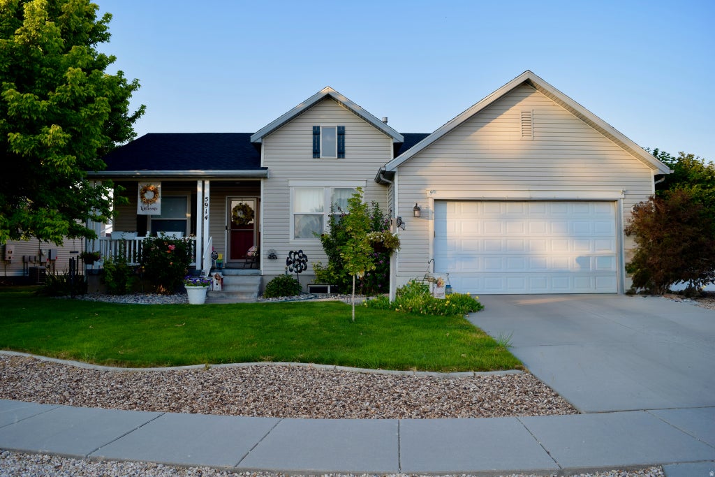 Photo of 5914 N GENOA LN, Stansbury Park, UT 84074 (MLS # 2177506)