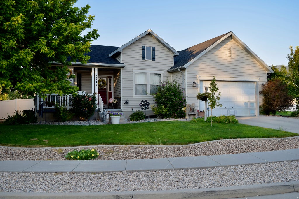 Photo of 5914 N GENOA LN, Stansbury Park, UT 84074 (MLS # 2177506)