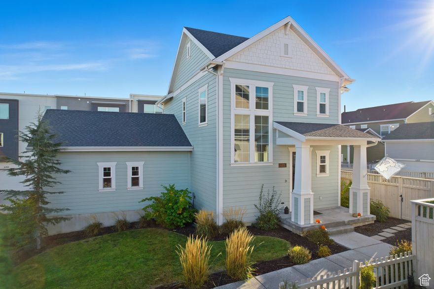 Rare fully fenced private backyard! Located in Daybreak's Highland Park Village, this immaculate home features an open floor plan with large windows, a bright kitchen with quartz countertops, gas range, stainless-steel appliances (fridge included), and an oversized island with barstool seating. Enjoy premier Daybreak amenities including high-speed internet, community rec center, two pools, splash pads, parks, BMX jumps, pump track, sports courts, and an outdoor amphitheater. The dining area opens to a covered patio and private yard. Primary suite includes a walk-in closet and ensuite bath with granite double vanity, soaking tub, and separate shower. Finished basement offers a spacious family room with a large 4th bedroom & full bathroom. All within walking distance to schools, trax, and the new Salt Lake Bees stadium and district entertainment center.