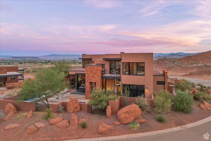 Welcome to Sentierre, Southern Utah's most anticipated and exclusive resort community, founded on the principle of holistic wellbeing, ''Many Paths, One Destination.'' Here, nestled against a backdrop of majestic Padre Canyon, we present a singular opportunity to own an architecturally stunning villa designed not just as a home, but as a destination for the soul. This magnificent, with Furniture Package Available/LIKE NEW FURNISHINGS, 5-bed, 5.5-bath residence spans an impressive 4,028 square feet of meticulously curated living space. Every detail is crafted to promote tranquility and seamless luxury. The gourmet kitchen, a culinary masterpiece, features state-of-the-art Wolf and Sub-Zero appliances, ready for creating nourishing meals or hosting elegant gatherings.  Throughout the home, integrated smart home technology provides effortless control over lighting, climate, and security, ensuring your environment is always perfectly attuned to your needs.  The true essence of this villa is its seamless fusion of indoor and outdoor living. Step outside to your private backyard sanctuary, a masterfully designed oasis featuring three distinct patios. Immerse yourself in the custom spoola perfect combination of a spa and poolwith the soothing sounds of cascading waterfalls as your soundtrack. As dusk settles, gather with loved ones around the elegant firepits, sharing stories under a vast, starry desert sky.  Beyond its function as a personal retreat, this property is a savvy, turnkey investment. It includes a private lock-off suite, complete with one bedroom, a mini-kitchen, and its own patio, offering perfect privacy for guests or a lucrative rental opportunity. **Developers are in the process of reorganizing the HOA fees, updated fee with be disclosed shortly**** call agents for details.