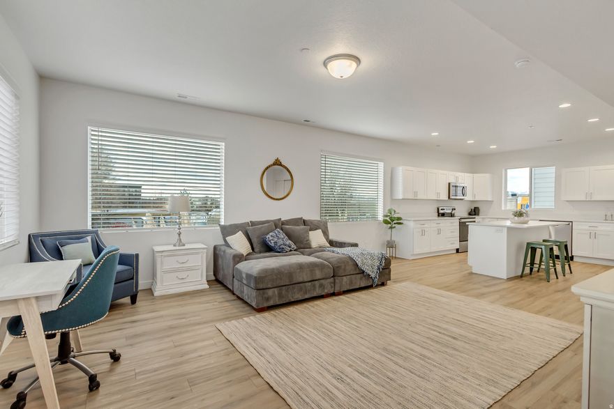 Townhome is only 2 years old and well taken care of. Dual Master Suites! Soft Close Cabinets/Drawers, Stainless Steel Appliances and Beautiful Quartz countertops! 9 foot ceilings! Gated community. Convenient location, close to Costco, Downtown, and the Airport.  Gated Community with Secured Access Entrance. Ready to move in! All appliances included, including the washer and dryer.