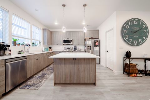 Photo of 6160 S MIRAMONTE WAY W #T30, Kearns, UT 84118 (MLS # 2121586)