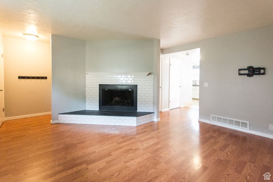 Beautifully updated Cottonwood Heights condo, tucked away in a prime location near Fort Union and Highland Drive. Inside, you'll find two spacious bedrooms with generous closet space, including a private balcony off one of them - perfect for morning coffee or evening relaxation. The kitchen & bathrooms have been nicely updated, and the inviting living room features a cozy fireplace. Step outside to your own private fenced backyard with a patio - ideal for entertaining or simply enjoying some quiet time. Other features include a 2-car carport with a storage closet, all appliances included, plus major recent upgrades: a new furnace, water heater, and roof. With easy access to the canyons, shopping, restaurants, and commuter routes, this condo offers the perfect mix of comfort and convenience. Square footage figures are provided as a courtesy estimate only and were obtained from County records. Buyer is advised to obtain an independent measurement.