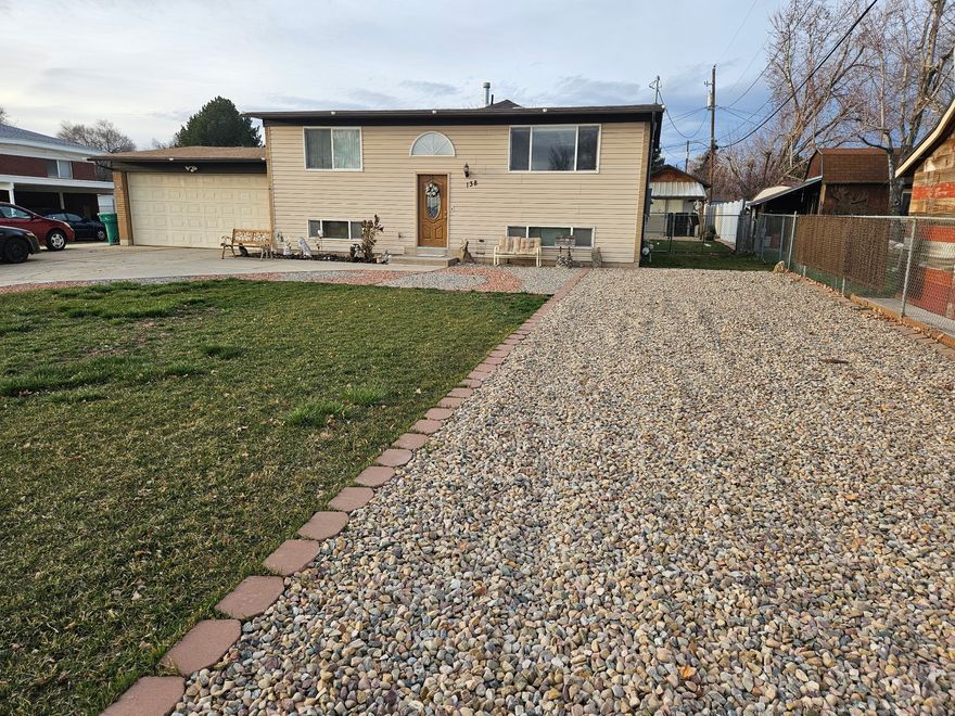 Lovely home that's been well taken care of with upgrades in the kitchen and all other rooms. A 1000sqft  family room and pantry was added upstairs in 2018. Downstairs has unfinished space for 2 bedrooms and a bathroom. There is a new outside entry as well as a new laundry room. Also in 2018 the electrical panel was updated inside and outside with 200 amp service. Everything was inspected. This property features a 12 x 28 shed with an awning and gravel to park on. The patio has a gas line run from the garage to the north side for grill or fire pit. There is a gas line in the garage but would have to be hooked up to the outside. This is a must see for a family with kids. The neighborhood schools are just across the street! Close to the Layton Hills  Mall, shopping, restaurants, banks. This is a wonderful centrally located neighborhood to I-15 and Hwy 89 while also being very walkable.   Square footage figures are provided as a courtesy estimate only and were obtained from county records.  Buyer is advised to obtain an independent measurement.