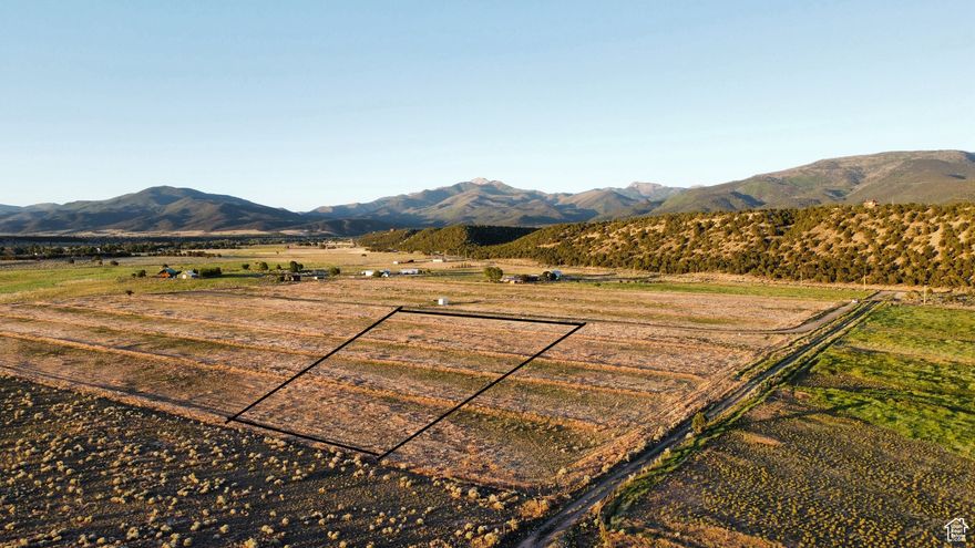 Discover the serene beauty of Mineral View Estates with this exceptional 5.01-acre lot, perfectly situated amidst breathtaking mountain and valley vistas. Whether you're seeking a peaceful escape or an adventurous lifestyle, this parcel offers the ideal setting to create your dream home. Imagine waking up each morning to awe-inspiring views, with the gentle sounds of nature surrounding you. This lot is not only spacious but also comes with animal rights, allowing you to bring your personal sanctuary to life, whether it's a few horses or a couple of friendly goats. You'll find the convenience of underground power already in place, making your building process as seamless as possible. Plus, with additional underground water available for purchase from the community well, you can ensure that your future garden and landscaping thrive in this idyllic environment. This stunning property blends privacy with accessibility, giving you the freedom to build a home that perfectly reflects your style while enjoying the tranquility of rural living. Don't miss this opportunity to secure your slice of paradise in Mineral View Estates  where your vision of country living can finally become a reality.