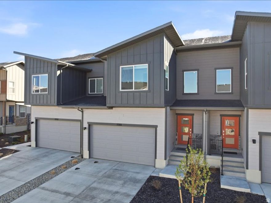 This newly built 3 bedroom, 3 bath townhome in Jordanelle Ridge Village offers a fresh take on comfortable living. Completed in 2024, the home features a modern, open layout where the kitchen, dining, and living spaces come together with ease, creating an inviting setting for both everyday living and time spent with others. The kitchen stands out with quartzite countertops, stainless steel appliances, a gas range, and a generous eat-in dining area that is as functional as it is welcoming.  Upstairs, the primary suite offers a quiet retreat with an en-suite bath and ample closet space, while two additional bedrooms provide flexibility for guests, a home office, and views of Mt Timpanogos. The unfinished lower level presents an opportunity to expand with additional living space, ideal for a future family room, bedroom, and bath designed to fit your lifestyle.  An attached two car garage provides plenty of room for vehicles and storage, while central air and forced air heating ensure year round comfort. Perfectly positioned between two reservoirs and surrounded by four public golf courses, the location invites an active lifestyle with easy access to fly fishing, trails, and open space, all while remaining close to the everyday conveniences that make Heber City such a special place to call home.