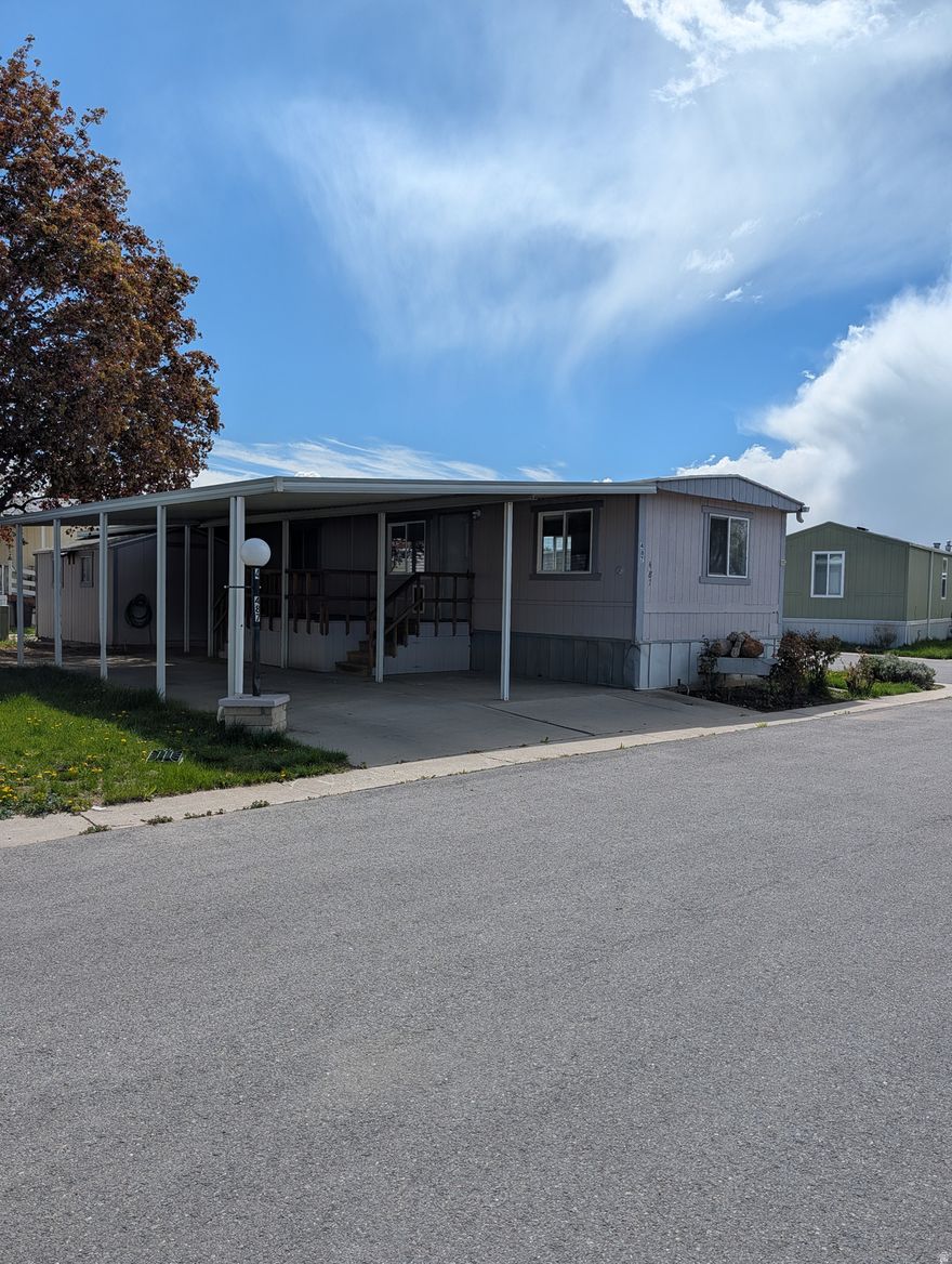 Mobile home located on a corner lot. Convenient access to State Street and the Orem conveniences and amenities. Mountain views. Lots of updates including flooring, painting and swamp cooler. At least one of the residents needs to be 55+. Lot rent is currently $380 per month and that covers water, sewer, garbage and snow removal. All information has been obtained from sources deemed reliable but it is the Buyer's responsibility to verify all information.