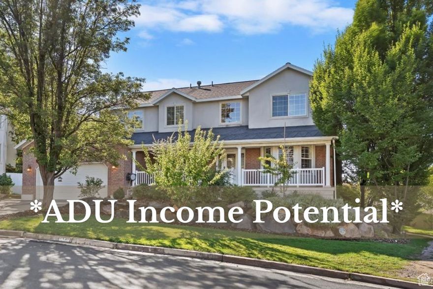 **ADU income potential in East Layton.** This charming home offers over 2,600 sq. ft. on the main and upper floors, plus a finished basement apartment (Tenants' lease ends Nov. 1). The main level features a formal living room, den/office, and updated kitchen with quartz countertops, new appliances and abundant cabinetry. Beautiful hardwood floors run throughout the main and upper levels. Upstairs are four bedrooms, including a primary suite with two walk-in closets and a private bath with separate tub and shower. A large covered deck spans the back of the home, and the corner lot includes mature landscaping for added privacy. Seller will consider a short-term lease with option to purchase, ideal for buyers who need to sell their current home before moving. Conveniently located near Hill AFB, Highway 89, I-15, Sand Ridge Park, and Kays Creek Parkway Trail.