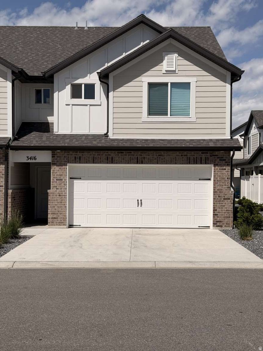 Offered at $390,000, this beautifully maintained end-unit townhome in West Haven presents an incredible opportunity-with comparable value potential up to $400,000. Located at 3416 W 3950 S, this spacious 1,533 sq ft home features 3 generously sized bedrooms and 2.5 bathrooms, providing both comfort and functionality. The open living area is perfect for relaxing or entertaining, while large windows showcase stunning mountain views you'll love waking up to each day.  The property includes a convenient 2-car garage and comes move-in ready with all major appliances-refrigerator, washer, and dryer are all included.   This desirable end unit provides added privacy and natural light, making it stand out from the rest.   Don't miss your chance to own a well-cared-for home in a scenic and convenient location.