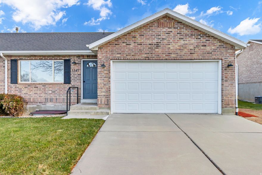 A beautiful twin home conveniently located on the East bench with quick access to the highway and everyday amenities. This home offers a functional layout designed for comfortable living.  The basement features a newly finished bedroom and bathroom, adding immediate value and flexibility. Finish the basement as needed for a future mother-in-law apartment, guest suite, private living space, or rec room.  Natural light fills the main living areas, and fresh carpet enhances the move-in-ready feel. Additional highlights include a two-car attached garage, no HOA, and beautiful mountain views. Whether you're looking for multi-generational living, rental potential, or simply extra space to grow, this home offers versatility and value in one of Utah County's most desirable communities.