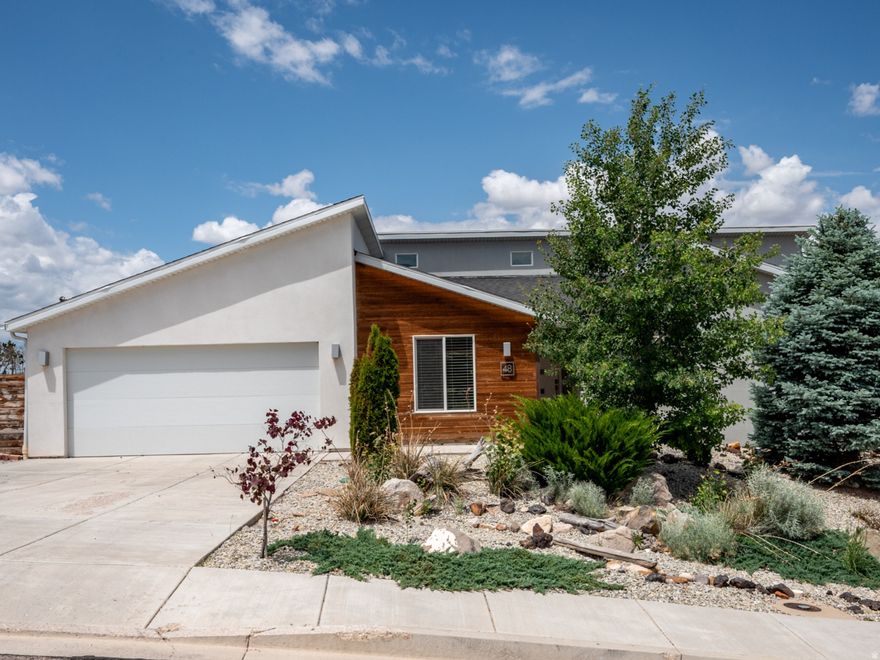 Welcome to your new home...this spacious 6-bedroom rambler with a finished basement, RV parking, and a versatile flex room in a highly desired west-side Cedar City, Utah neighborhood. Built in 2015, this move-in ready home features an open-concept main level with a bright kitchen, main-floor primary suite, and convenient laundry. The downstairs offers additional bedrooms, a large family room, and generous storage. A unique flex room with both interior and exterior access is perfect for a home office, studio, guest suite, or private retreat. Close to I-15, shopping, dining, parks, schools, and Southern Utah's incredible outdoor recreation-hiking, skiing, biking, and national parks.