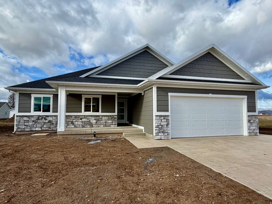 Beautiful, quality new construction in a brand new subdivision in Preston. Come see the extra time and attention to detail put into this home by one of the best builders around. 4 bedrooms, 2 1/2 bathrooms, huge open kitchen and family room and large bedrooms. Some of the features are: quartz countertops, triple pane windows, insulated garage, upgraded insulation throughout, LED lighting, covered patio, and even a shed in the backyard for extra storage. This is a must see!