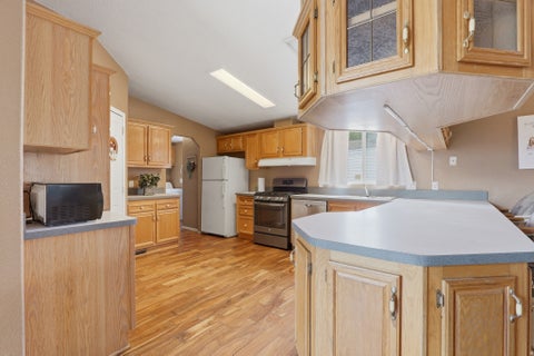 Tiny photo for 1245 W ROCK RIVER RD, West Valley City, UT 84119 (MLS # 2179449)