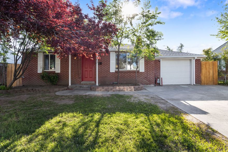 Don't let the modest exterior fool you-this beautifully updated home opens up to a surprisingly spacious and inviting interior. Featuring 4 bedrooms and 2 full bathrooms, there's plenty of room for comfortable living and entertaining. The generously sized primary bedroom offers ample space to unwind, complete with double closets for all your storage needs. The fully remodeled kitchen shines with brand-new appliances, modern finishes, and a layout designed for both functionality and style. A bright and airy sunroom extends your living space and provides the perfect spot to relax year-round, with direct access to a large backyard enclosed by a brand-new fence-ideal for gatherings, pets, or simply enjoying the outdoors. An attached garage offers abundant storage, and the convenient mudroom just inside the entry helps keep everything organized. This home perfectly blends cozy curb appeal with an open, spacious interior you'll love coming home to.