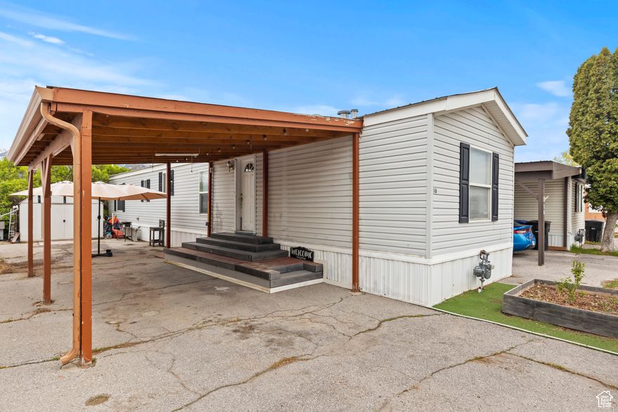 Welcome to this well maintained 2 bedroom, 1 bath home, this mobile home features vaulted ceilings and abundant natural light, creating an open and inviting atmosphere. The interior has been improved over time, offering a clean and comfortable living space. Enjoy the benefit of a new roof and a covered patio. Schedule your showing today! Square footage figures are provided as a courtesy estimate only. Buyer is advised to verify.