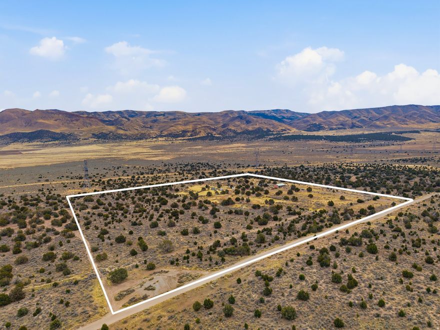 SOLD AS IS!  Escape to wide-open space and unmatched privacy with this rare 50-acre off-grid property offering breathtaking panoramic mountain views in every direction. Nestled in the peaceful outskirts of Elberta, this expansive land provides the perfect opportunity to create your personal retreat, recreational getaway, or future homestead. An aprox. 2,600 sq ft structure sits on the property-ideal as a starting point for a custom build, storage, workshop, or conversion into a living space. The property is already equipped with a septic system, giving you a valuable head start on infrastructure for off-grid living. With rolling terrain, sweeping valley views, and the kind of serenity you can't find in the city, this land is an incredible canvas for your vision. Whether you're looking to build, invest, or enjoy as is, the possibilities are wide open. Square footage figures are provided as a courtesy estimate only and were obtained from county records .  Buyer is advised to obtain an independent measurement. Reach out for information sheet!