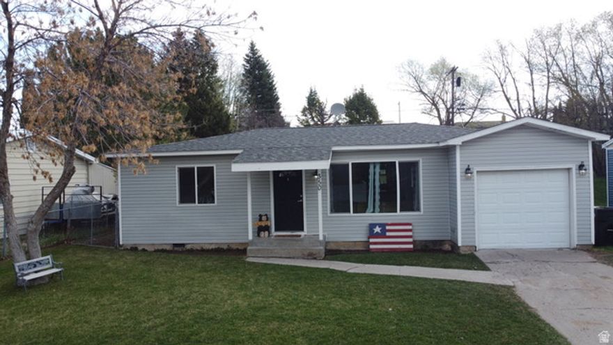 This charming 3-bedroom, 1-bath home is filled with natural light and features fresh updates throughout. New paint, updated trim, and stylish flooring create a bright, clean feel, while the functional layout offers comfortable everyday living. The kitchen has been refreshed and includes a welcoming bar area perfect for gathering along with a new refrigerator, dishwasher, stove, and microwave. A washer and dryer are also included for added convenience. Enjoy the added benefits of a 1-car attached garage and a spacious, fenced yard. Conveniently located near walking trails and local amenities, this home also presents a great opportunity for investors. Schedule your showing today!