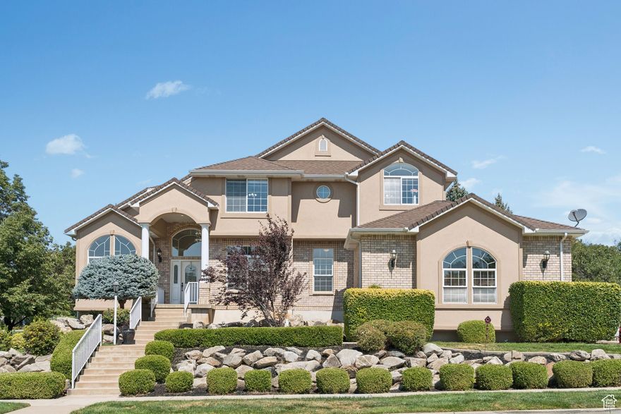 Perched on Ogden's coveted east bench, this stunning 2-story home offers nearly 5,000 square feet of living space, breathtaking mountain and valley views, and quality upgrades throughout. Featuring 4 spacious bedrooms, 2.5 baths, and soaring vaulted ceilings, the home welcomes you with an open, airy feel and abundant natural light. Built in 1996 and thoughtfully updated, you'll love the blend of classic design and modern touches. Enjoy upgraded finishes, large living and gathering areas, and a layout perfect for entertaining or quiet evenings at home. Located just minutes from trailheads, skiing, and downtown Ogden, this is east bench living at its finest.