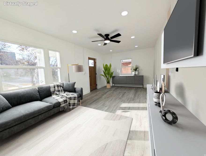 *NEW Price improvement* In the heart of Salt Lake's highly sought-after Marmalade District, this fully remodeled bungalow blends timeless charm with upscale modern living. Every detail has been thoughtfully upgraded with high-end finishes. Recent upgrades include a newer 50-year roof, tankless water heater, and central AC-ensuring comfort and peace of mind for years to come. Enjoy ultra-fast Google Fiber, a spacious landscaped yard, and off-street parking, all just minutes from downtown. With its unbeatable location, turnkey condition, and historic character, this home is a rare opportunity to own a luxurious slice of SLC's most coveted neighborhood.