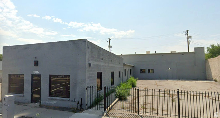 This large building comes with a separate parcel to the south for extra parking and a large warehouse to the north with an overhead door and 3-phase power, making this location great for an automotive shop or car lot.  Zoning is CC-Commercial Corridor. See https://codelibrary.amlegal.com/codes/saltlakecityut/latest/saltlakecity_ut/0-0-0-66206#JD_21A.33.030 for permitted and conditional uses.  Interior has just been renovated to a vanilla shell condition with new HVAC, new bathroom fixtures, noise cancelling windows, and fresh paint.  *There's an added loft and office area upstairs overlooking the warehouse, with plumbing for another toilet.  Great State Street location!  Call or text agent for showing.  *Square footage with the added loft/office is 6,622 SF.