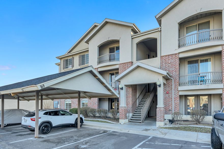 WALK RIGHT IN to this MAIN-FLOOR condo in the HEART of Pleasant Grove!  No stairs, no outside maintenance, just easy living.  Clean and ready for first time home buyers, seniors, or investors.  Updated Furnace/AC, Hot Water Heater, Water Softener, and Washer and Dryer - all included.  Large family room with French doors out to the covered patio with storage.  Wide open kitchen has knotty pine cabinetry, granite countertops, and clean white appliances.  Laundry room with cabinetry and shelving storage.  Primary bedroom has LARGE walk-in closet and private bath with spacious countertops.  One covered parking space with extra parking nearby.  Easy freeway access.  SO CLOSE to grocery, restaurants, and commercial, yet tucked into the complex away from it all.  Right across from grass area, picnic, and playground.  OPEN HOUSE Saturday 1/24 from 11-2.  Photographs are virtually staged.