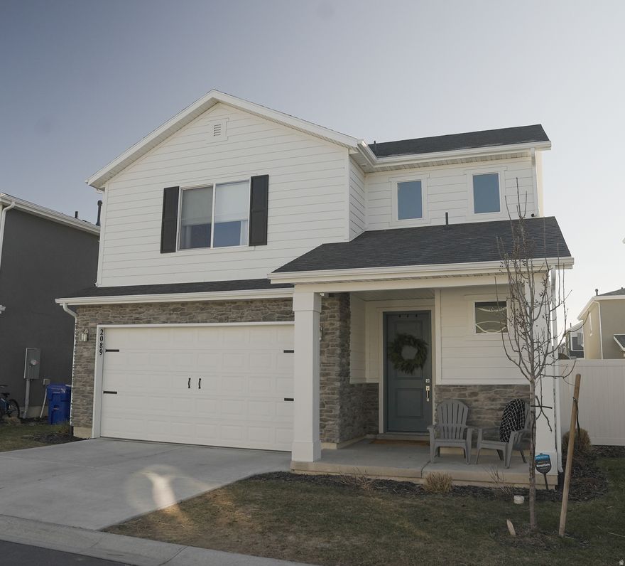 Welcome to this beautifully maintained 3-bedroom, 2.5-bath single-family home in the desirable Stillwater subdivision of Syracuse. This newer home has several upgrades with a modern and move-in-ready feel.  The kitchen features an upgraded island with quartz countertops, a pantry, and flows seamlessly into the living room, which includes a built-in TV and fireplace area-perfect for relaxing or entertaining. Well-sized bedrooms make this home ideal for first-time buyers or small families.  Located in a quiet neighborhood, the HOA includes access to a pool, gym, and bookable event space. Just minutes from Jensen Nature Park and great shopping and dining options, this home offers comfort, convenience, and community. (Square footage is from county records)