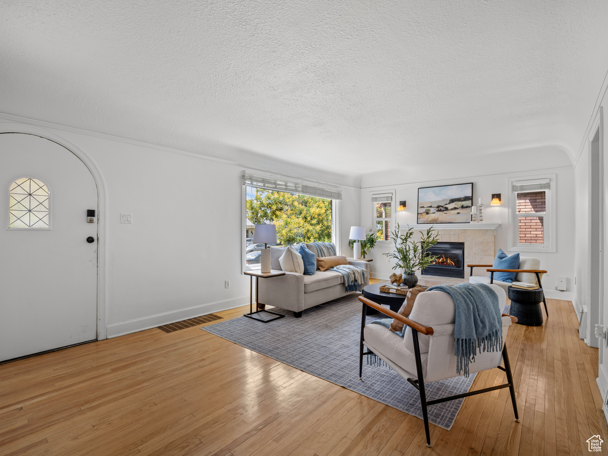 This highly desirable, legal duplex is just blocks from Liberty Park and offers endless potential, whether you're looking for a high-performing rental or a home where you can live in one unit and earn income from the other. The main unit boasts 3 spacious bedrooms and 2 bathrooms across 2,102 sq. ft., featuring a bright kitchen with its own dining space, a large family room, a separate dining area, and a full basement family room that's perfect as a hangout spot or private home office. The charming basement apartment includes 1 bedroom, 1 bathroom, and plenty of rental or guest potential, making it ideal for investors or homeowners alike. Property has a BRAND NEW ROOF, and already features fresh paint, an updated shower unit, newer flooring, and a convenient 2-car garage. Plus, the inspection report is complete and available for the next buyer to help save on costs. This is a rare opportunity in a prime location - come see this duplex while it lasts! Please add any closing costs you would like to the purchase price, if your buyer is requesting them.